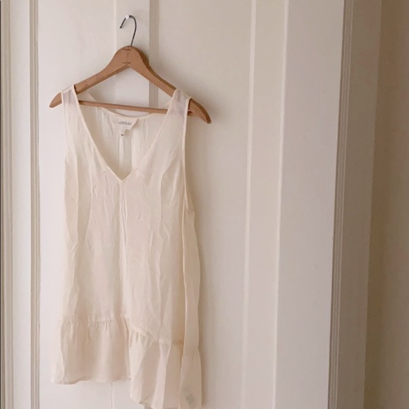 THE GREAT. Tops - The Great sleeveless peplum ivory silk top